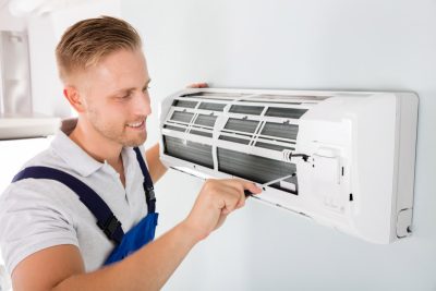 Ductless AC Maintenance North Highlands HVAC technician maintaining a ductless air conditioner in North Highlands